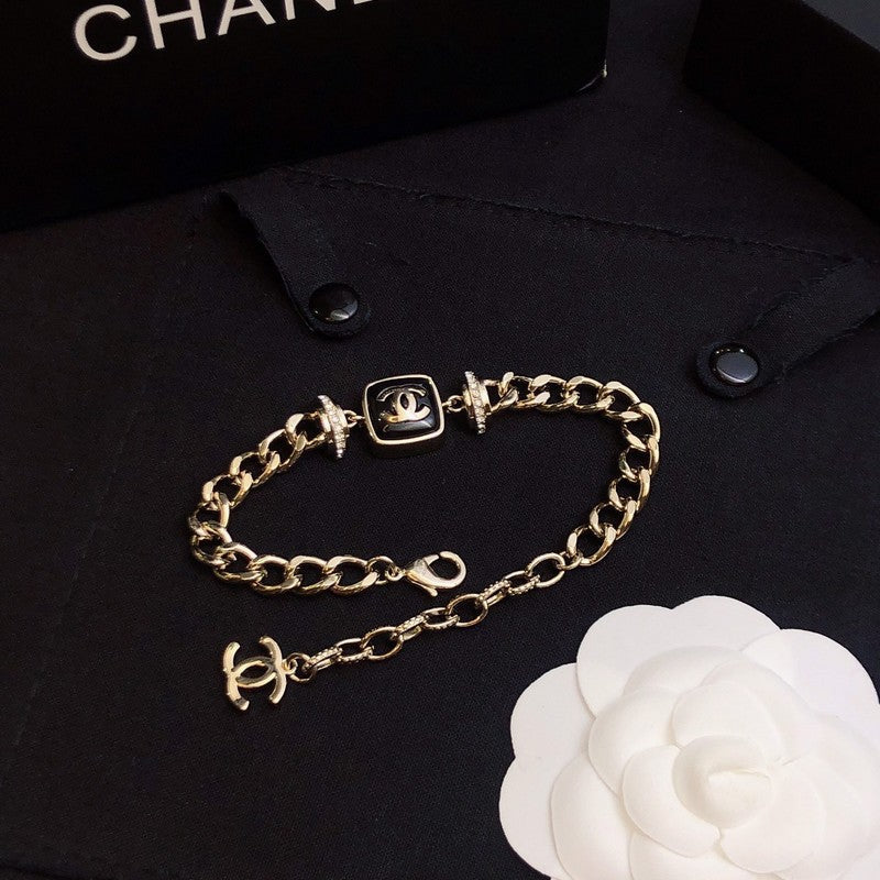 Chanel Black Logo Gold Chain Bracelet