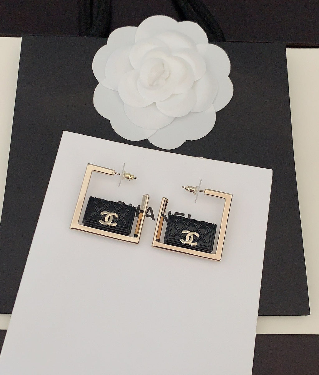 Chanel Black Bag Pendant Earrings - 18K Yellow Gold