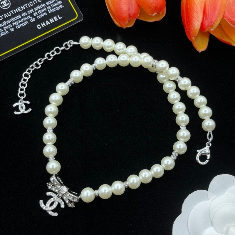Chanel Bow Tie Pearl Necklace